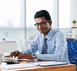 An employee working on a computer