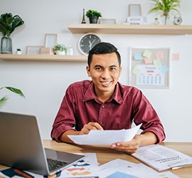 An employee working on a computer