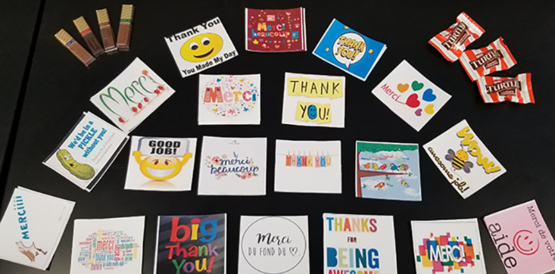 variety of recognition cards on a table